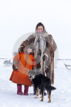 The extreme north, Yamal, the past of Nenets people, the dwelling of the peoples of the north, a family photo near the yurt in the