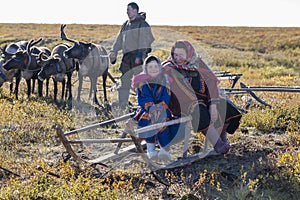 The extreme north, Yamal, the past of Nenets people, the dwelling of the peoples of the north, a family photo near the yurt in the