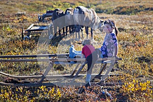 The extreme north  Yamal  the past of Nenets people  the dwelling of the peoples of the north  a girl playing near the yurts in