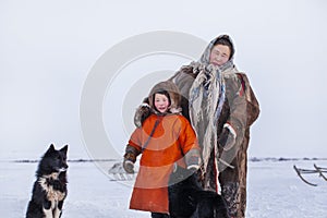 The extreme north, Yamal Peninsula, the past of Nenets people, the dwelling of the peoples of the north, a family photo near the