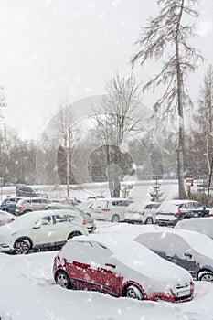 Extreme snowfall with cars coverd with a lot of snow in Europe, Slovakia, mountain district