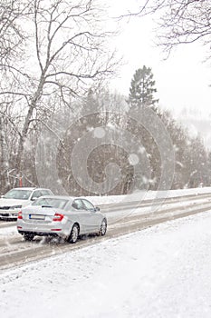 Extreme snowfall with cars coverd with a lot of snow in Europe, Slovakia, mountain district