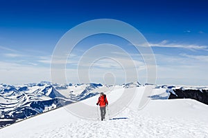 Extreme Sport. Lone hiker in winter mountains