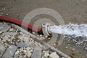 Extreme weather - water being pumped out of a flooded basement in Cologne