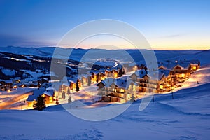 extreme wide-angle view of a ski resorts lodges at dusk