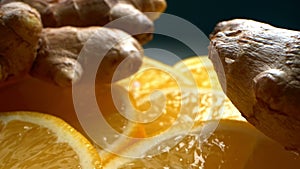 extremely close-up, detailed. slices of juicy lemon and ginger root