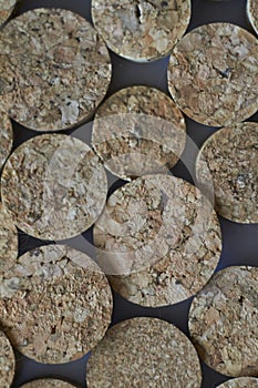 Extremely close-up of homemade chopped wine cork note board, selective focus