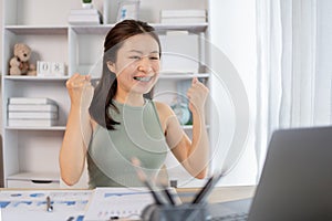 Extremely happy, Smiling young woman delighted or surprised with passing exams and good grades