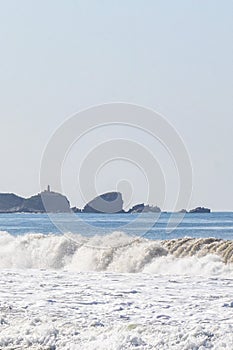 Extremely huge big surfer waves beach La Punta Zicatela Mexico