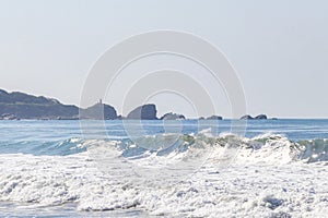 Extremely huge big surfer waves beach La Punta Zicatela Mexico