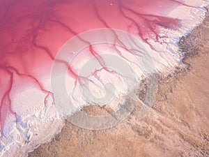 Extremely salty pink lake, aerial view, natural abstract background