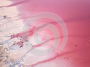 Extremely salty pink lake, aerial view, natural abstract background