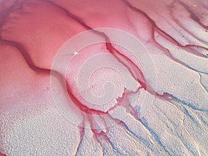 Extremely salty pink lake, aerial view, natural abstract background