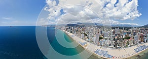 Extremely wide angle panoramic aerial photo of the city of Benidorm in Spain showing a panoramic drone view of the whole of