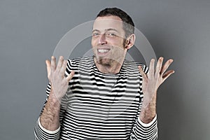 Extrovert 40s man expressing himself with hands