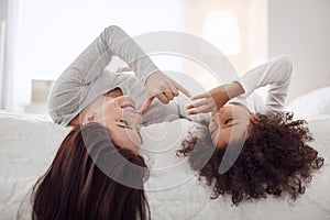 Exuberant mother and daughter having fun