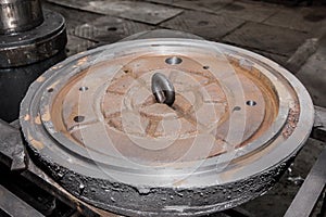 Eye bolt mounting in cast iron manhole, production of manholes at the factory