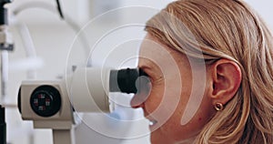 Eye care, machine test and woman in office to check iris, pupil and eyesight with professional. Technology for vision