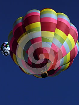 Eye catching balloons glowing in the skies at the Albuquerque International Balloon Fiesta photo