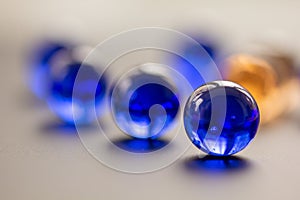 Eye catching blue marble with blurred background - stock photo.jpg