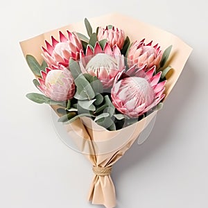 Eye-catching Bouquet Of Pink Proteas Wrapped In Paper