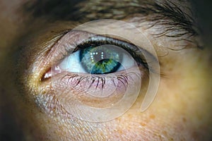 Eye close view. Human eye glance photo background. Emotional look, human face elements