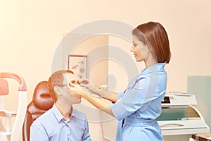 Eye doctor diagnostic. Patient at medical clinic.