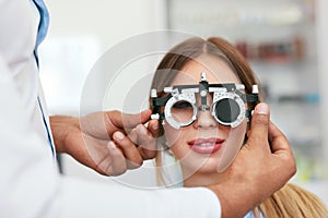 Eye Exam. Woman In Glasses Checking Eyesight At Clinic