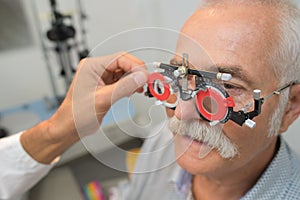 Eye examination at ophtalmologist photo