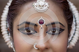 Eye of indian woman odissi dancer face close up