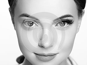 Eye lashes, lash extension woman lashes close up macro monochrome