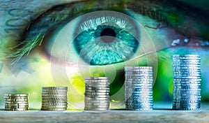 Eye looks to the future business. Concept of observation, control of finance in business.