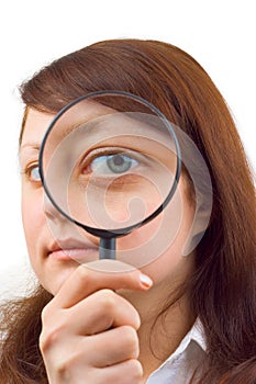 Eye and magnifying glass photo