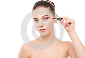 Eye make up apply. Mascara applying closeup, long lashes. makeup brush. Isolated.
