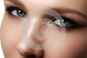 Eye makeup. Beautiful eyes make-up. Holiday makeup detail. Long