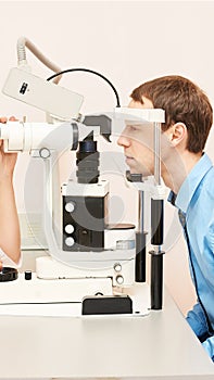 Eye ophthalmologist exam. Eyesight recovery. Astigmatism check concept. Ophthalmology diagmostic device.