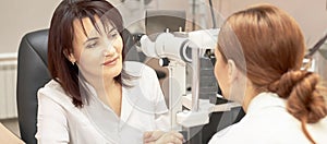 Eye ophthalmologist exam. Eyesight recovery. Astigmatism check concept. Ophthalmology diagmostic device. Beauty girl portrait in