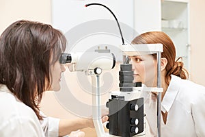 Eye ophthalmologist exam. Eyesight recovery. Astigmatism check concept. Ophthalmology diagmostic device. Beauty girl portrait in
