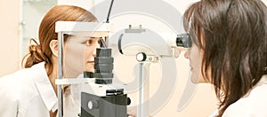 Eye ophthalmologist exam. Eyesight recovery. Astigmatism check concept. Ophthalmology diagmostic device. Beauty girl portrait in