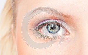 Eye with pink and green make-up