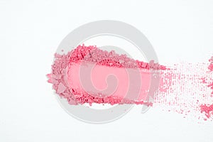 Pink eye shadow or pink bronzer smudge on white background