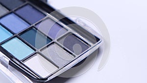 eye shadow palette on white background close-up