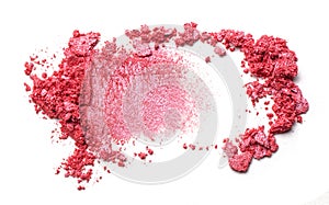 Eye shadow on a white background. Scattered blush sample for makeup. Red color.