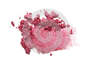 Eye shadow on a white background. Scattered blush sample for makeup. Red color.