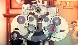 Eye sight vision test machine measurement with vintage and retro photo effect.