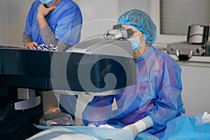 Eye surgeons perform surgery on the patient. surgeons at work. medical conceptions