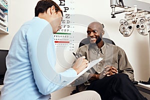 Eye test, exam or screening with an optometrist, optician or ophthalmologists with an ophthalmoscope, testing vision and