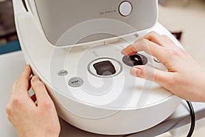 Eye tonometry. Non-contact tonometer. Glaucoma checkup. Optometry equipment.