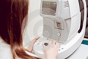 Eye tonometry. Non-contact tonometer. Glaucoma checkup. Optometry equipment.