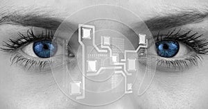 Eye of woman looking at cloud computing digital interface